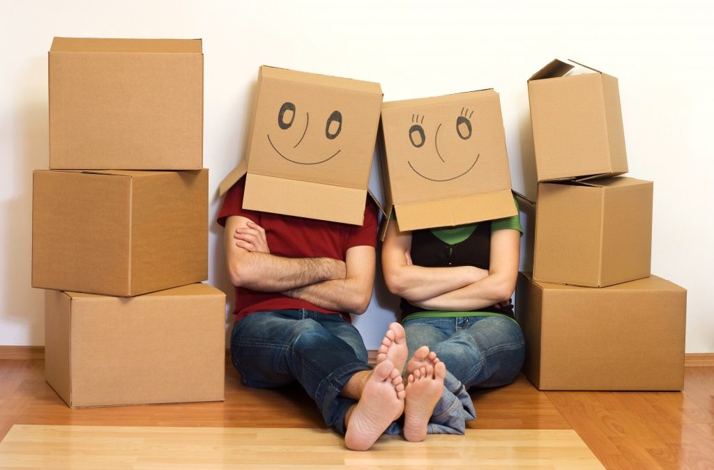 people with boxes on their heads