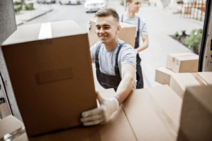 long distance moving companies loading boxes into moving truck